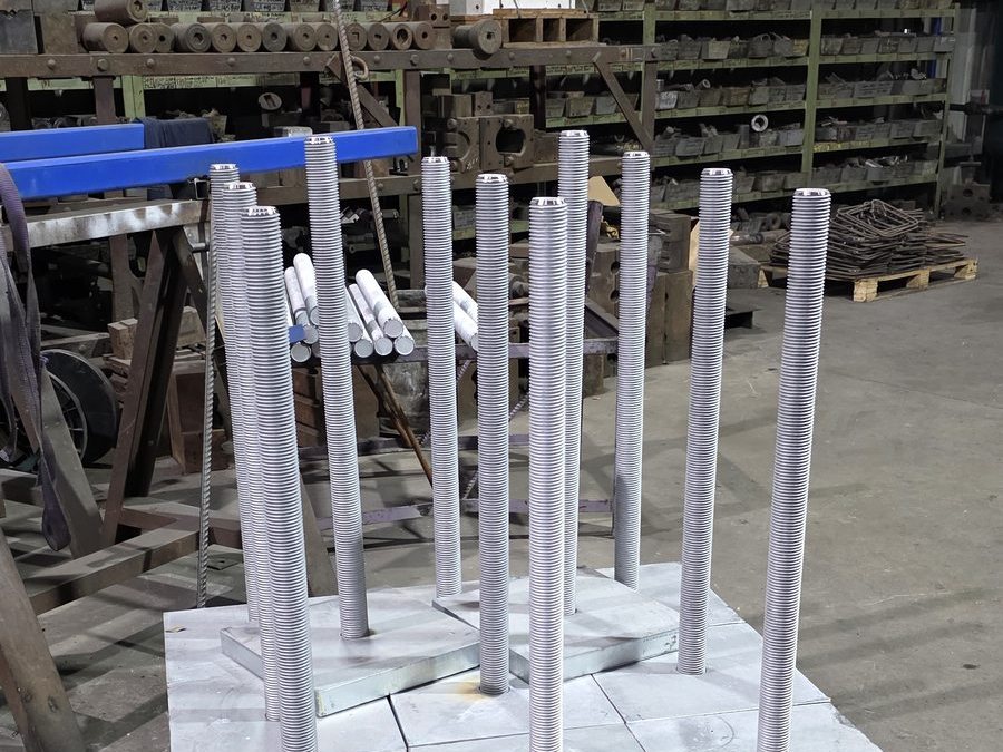 Custom anchor bolt assemblies